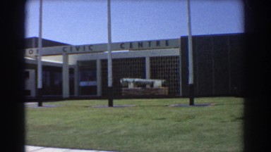1967: recording of a civic center, then driving down a residential road