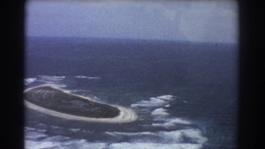 1967: a beautiful island in the sea with calm blue water PERTH AUSTRALIA