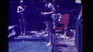 1937: girl jumping into the swimming pool. SOUTHHAMPTON NEW YORK