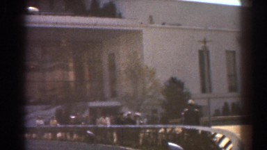 1939: visitors walking in front of a huge arena. NEW YORK WORLDS FAIR