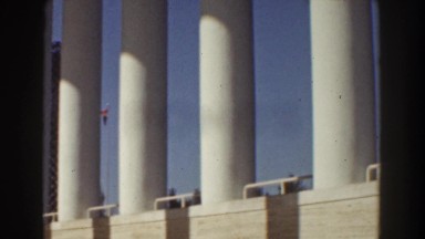 1939: people walking around a monumental building. NEW YORK WORLDS FAIR