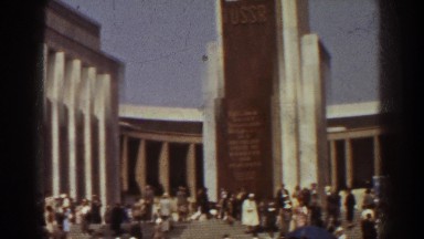 1939: people in the street working up in down. NEW YORK WORLDS FAIR