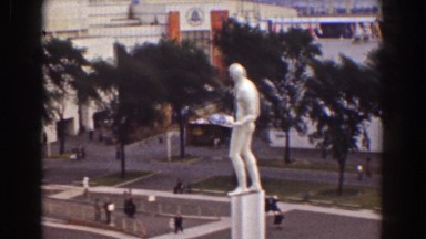 1939: a huge statue standing in the middle of the city. NEW YORK WORLDS FAIR