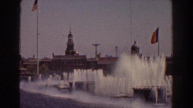 1939: fountains in the middle of water spewing water on windy day in romania