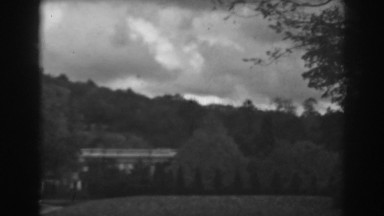 1938: storm rolls in over manicured park setting. WINCHESTER MARYLAND