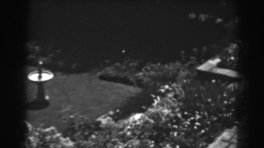 1938: top view of a garden with a fountain like pillar in between WINCHESTER