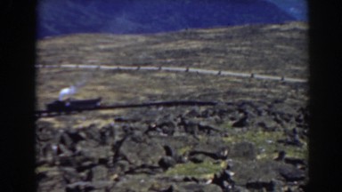 1938: a train rolls down the track in the wilderness MOUNT WASHINGTON