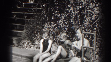 1938: Woman and Two Girls Sitting on Edge of Swimming Pool Cumberland