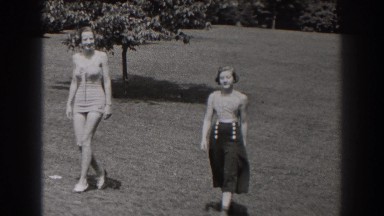 1938: women leisurely walking across grassy hillside NEW JERSEY