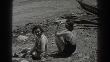 1938: pretty girls sitting by the lake. NEW JERSEY