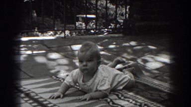 1938: baby smiles while on blanket NEW JERSEY