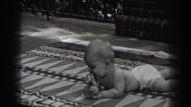 1938: cute baby on floor looking around and looking at camera NEW JERSEY