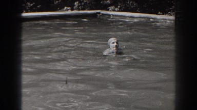 1938: a lady with cap is swimming in the water of the pool NEW JERSEY