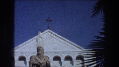 1976: Pillar and Statue of a Saint and of Mary at a Catholic Monastery