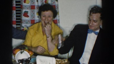 1957: small party gathered and eating around the table WHEELING OHIO