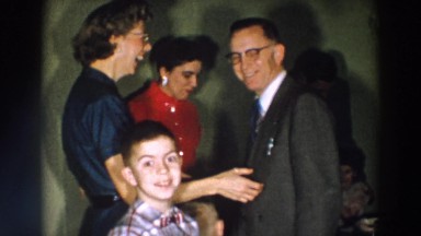 1957: enjoying party and there are lot of drinks on the table