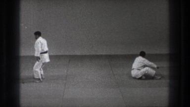 1971: two sparring eastern-style wrestlers in the gym TOKYO JAPAN