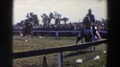 1957: riders on horseback displaying their skill to the audience WHEELING OHIO