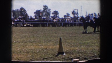 1957: Cowboys and Cowgirls Riding Horses in Pasture Near Arena, Wheeling Ohio