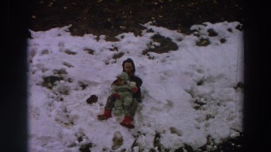1958: kids playing out in the snow. ITALY