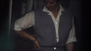 1958: woman standing inside her kitchen. ITALY