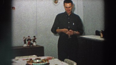 1958: young man splits acorn using nutcracker during the holiday season ITALY