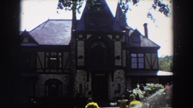 1964: An Old-Style Two-Story House in California at Daytime