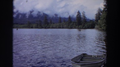 1964: beautiful sighting of a quiet lake, accompanied by the mountains