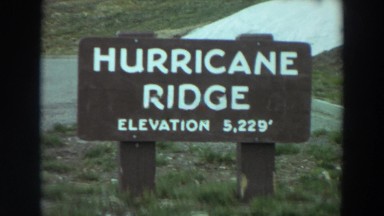 1964: marker indicating "hurricane ridge: elevation 5,229'" and parking lot.