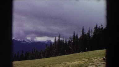1964: hills, forest and mountains seen on a very cloudy day WASHINGTON