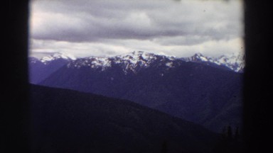 1964: snow capped ridge top of a mountain range. WASHINGTON