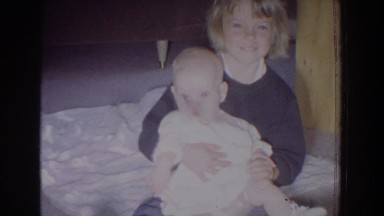 1965: child holding baby FALLSTON MARYLAND