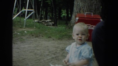 1965: little baby playing in the dirt. FALLSTON MARYLAND
