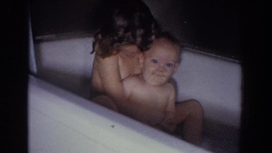 1965: big sister and baby in the bathtub together FALLSTON MARYLAND