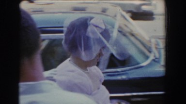 1960: a bridesmaid steps up behind a wedding procession BEL AIR MARYLAND