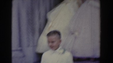 1960: a group of people are participating in a marriage ceremony BEL AIR