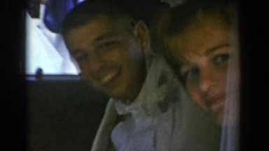 1960: a couple smiling in the car on their wedding day. BEL AIR MARYLAND