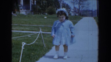 1960: little kid playing on the sidewalk. BEL AIR MARYLAND