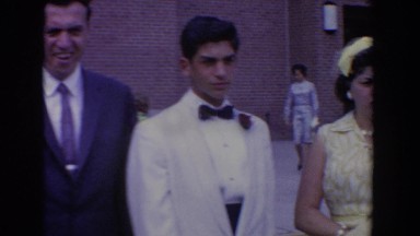 1960: men in suit with woman in a party dress BEL AIR MARYLAND