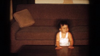 1960: baby stands BEL AIR MARYLAND