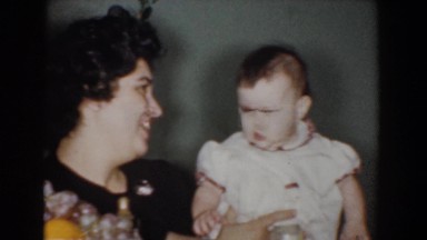 1960: adults holding the baby. BEL AIR MARYLAND