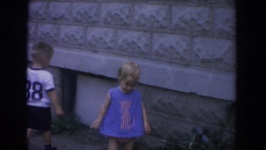 1965: children playing in the backyard of a house FALLSTON MARYLAND