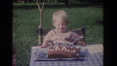 1965: children are gathered at a young boy's outdoor picnic birthday party