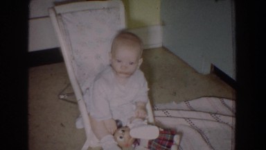 1965: little baby sitting in the floor. FALLSTON MARYLAND