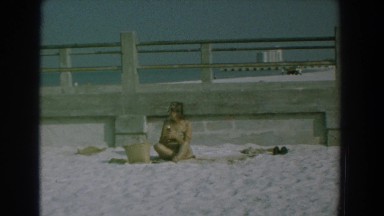 1958: lonely old women on a beach waiting for lover YORKTOWN VIRGINIA