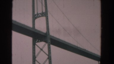 1958: a steel suspension bridge on a gray, cloudy day YORKTOWN VIRGINIA