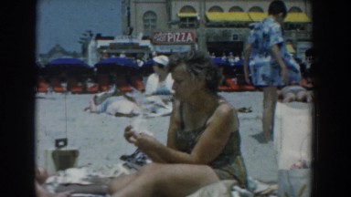 1958: women sitting out in the sand. YORKTOWN VIRGINIA
