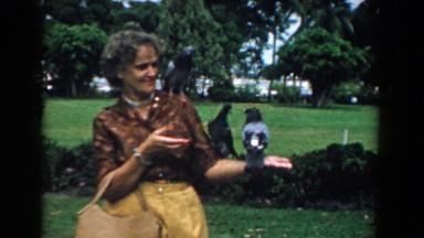 1958: Woman Surrounded by Cute Birds in South Carolina