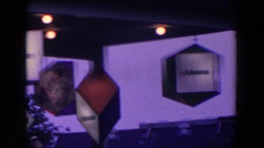 1964: boxes of light floating in air with tag line WORLD'S FAIR, NEW YORK CITY
