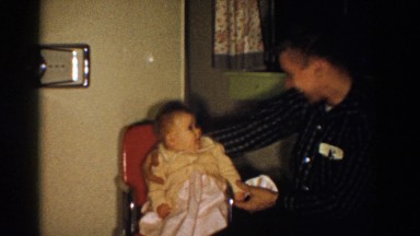 1958: Mother Sitting With Her Nicely Dressed Child In Chair Aliquippa